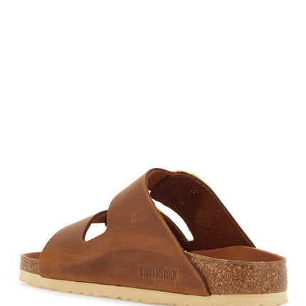 Birkenstock oiled leather cognac slippers with large golden buckles