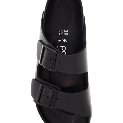 Birkenstock black leather platform sandals with two straps and metal buckles