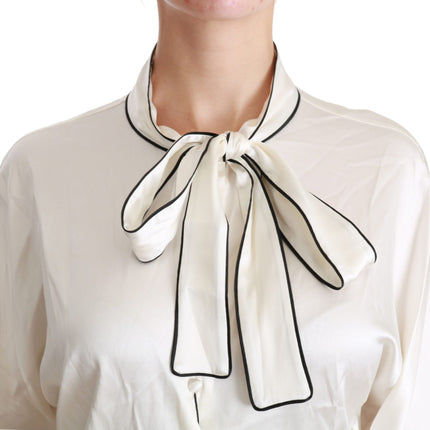 Elegante beige zijden blouse met boog sjaal