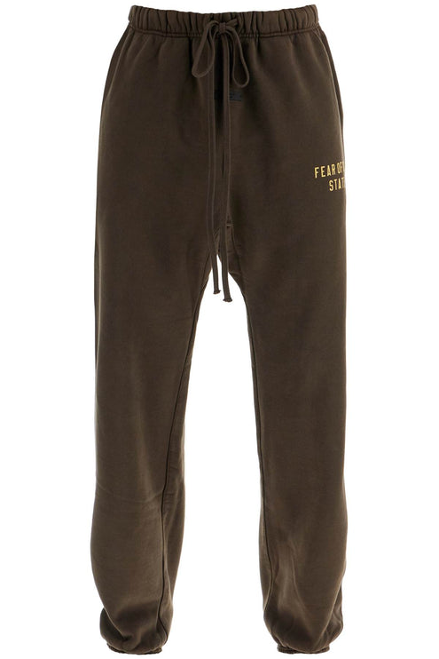 Fear Of God ESSENTIALS dark brown cotton sweatpants modern design