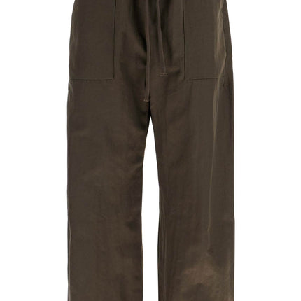 Fear Of God ESSENTIALS textured nylon utility pants for versatile