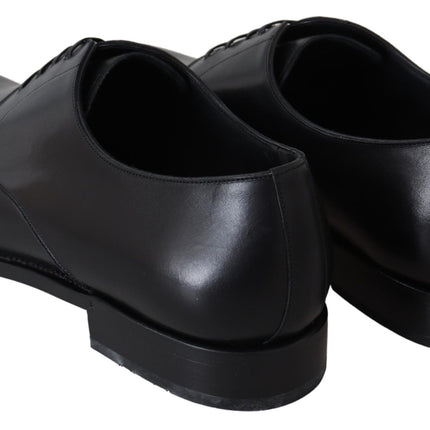 Elegantes zapatos de vestir derby de cuero negro