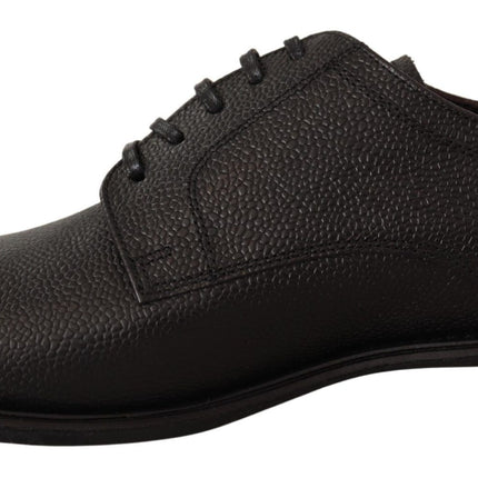 Elegantes zapatos de vestir derby de cuero negro