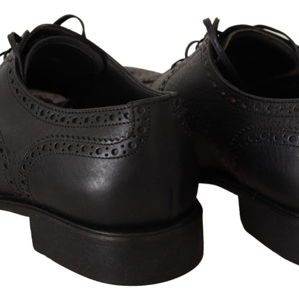 Elegantes zapatos de ala de ala de cuero negro de cuero negro