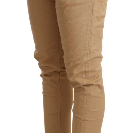 Pantaloni magri beige a metà vita slim fit