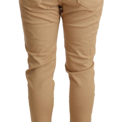 Pantaloni magri beige a metà vita slim fit