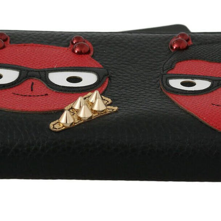 Elegante cartera continental de piel roja y negra