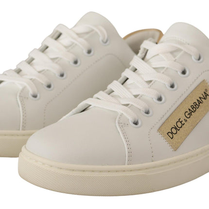 Eleganti sneaker in pelle bianca con accenti d'oro