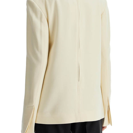 Toteme beige long sleeve top with applied pockets in viscose and wool