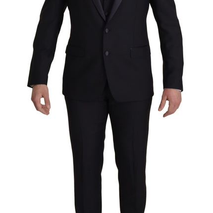 Elegante traje negro de lana de tres piezas