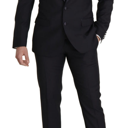 Elegante traje negro de lana de tres piezas