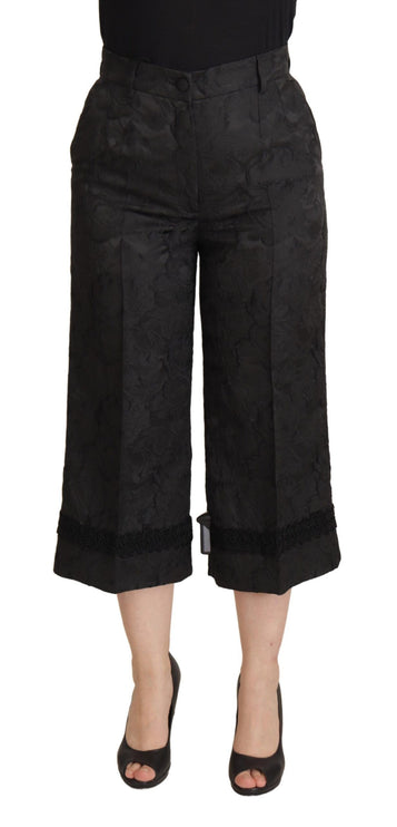 Elegantes pantalones cortados de brocado negro