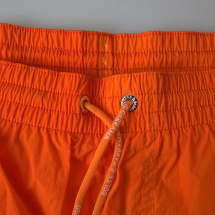 Pantalones cortos de natación de efecto de gradiente en naranja vibrante