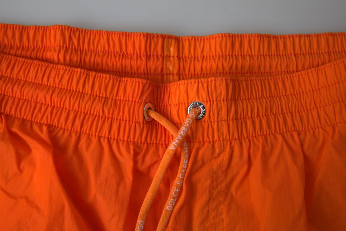 Pantalones cortos de natación de efecto de gradiente en naranja vibrante