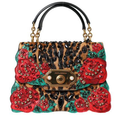 Elegante bolso de mano adornado con leopardo y rosas rojas