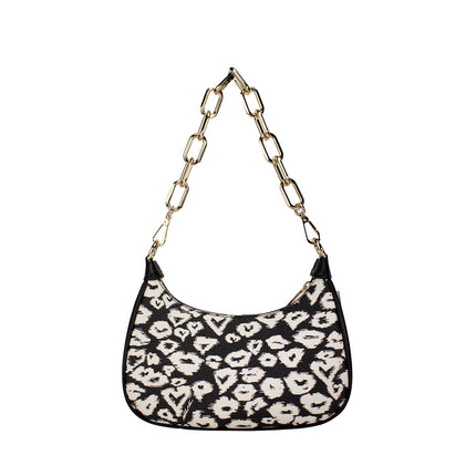 Cora Bolso Crossbody mediano de PVC con cremallera y estampado de corazones