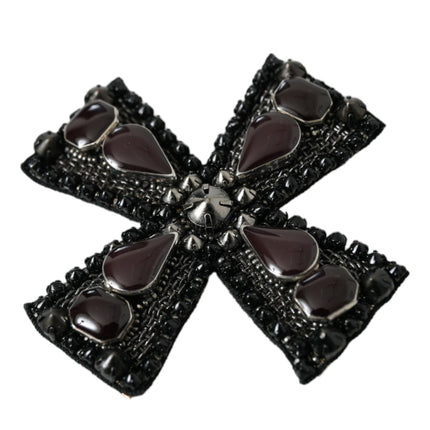 Broche à broches croisées ornées de cristaux noirs