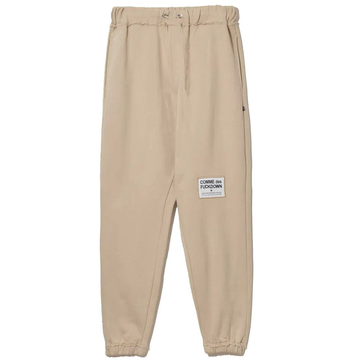 Pantalones de chándal de algodón beige elegantes con detalles deshilachados