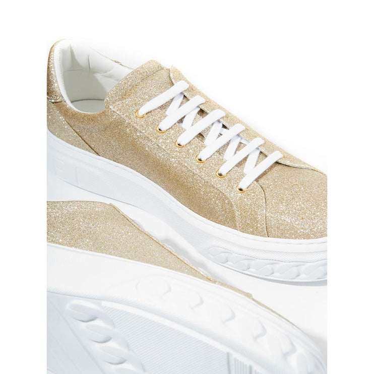 Eleganti sneaker in pelle dorata