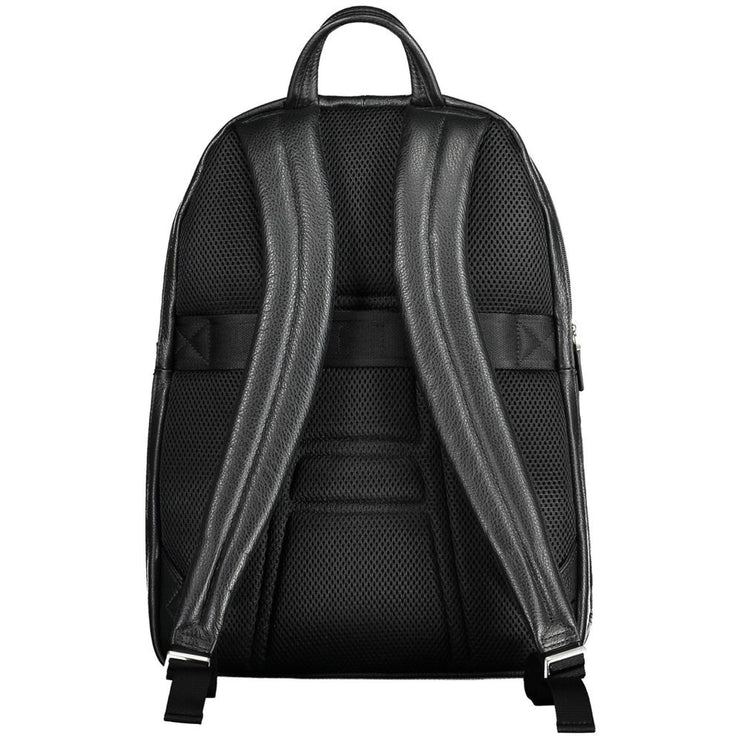 Elegante mochila de piel negra con compartimento para portátil