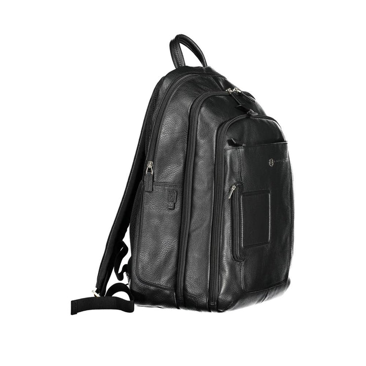 Elegante mochila de piel negra con compartimento para portátil