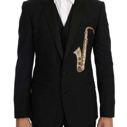 Costume élégant en trois pièces noires avec broderie de saxophone