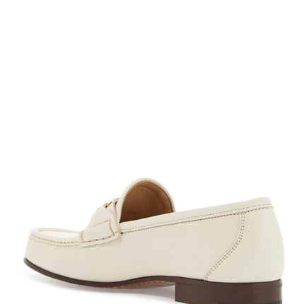 Valentino Garavani ivory leather loafer with golden metal v logo