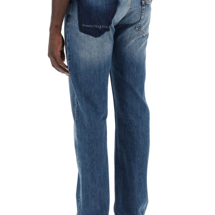 Alexander Mcqueen straight leg jeans with faux pocket on the back.