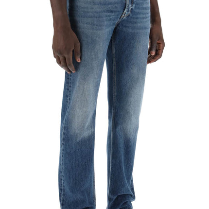 Alexander Mcqueen straight leg jeans with faux pocket on the back.