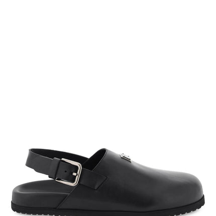 Dolce & Gabbana leather clogs with logo plate