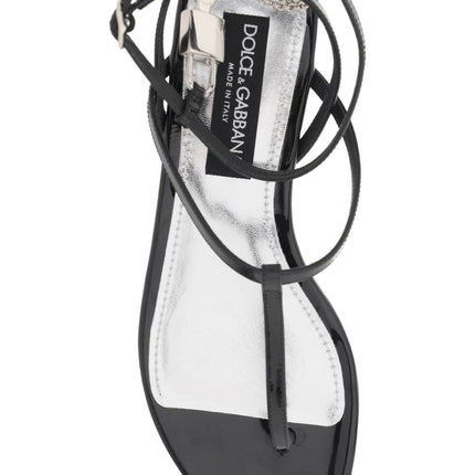 Dolce & Gabbana patent leather thong sandals with padlock