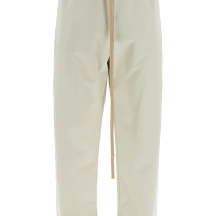 Fear Of God wide leg nylon track pants in cement