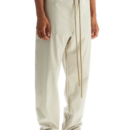 Fear Of God wide leg nylon track pants in cement