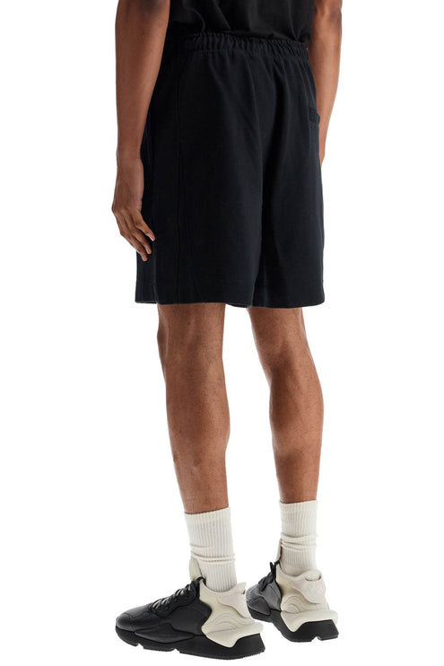 Y-3 black cotton shorts with white stripes