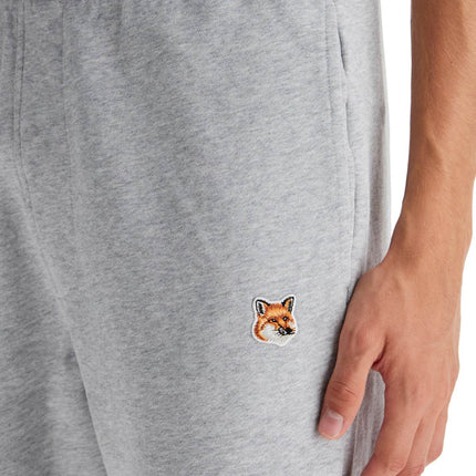 Maison Kitsune fox head joggers