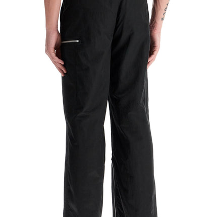 OUR LEGACY tactical cargo pants in technical satin fabric