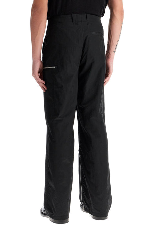 OUR LEGACY tactical cargo pants in technical satin fabric