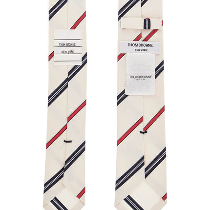 Thom Browne classic ivory tie with red and blue stripes in silk and cotton