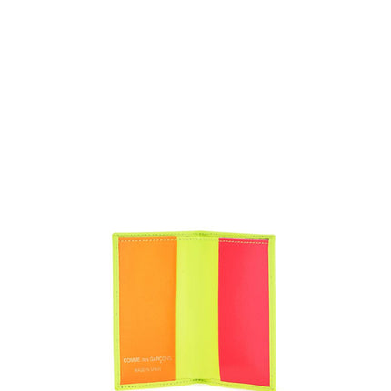 Comme Des Garcons Wallet compact wallet in fluorescent yellow goat leather