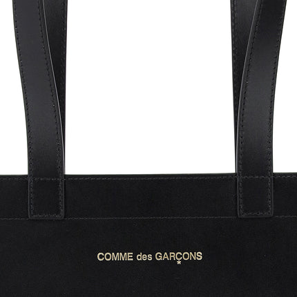 Comme Des Garcons Wallet leather tote bag with logo