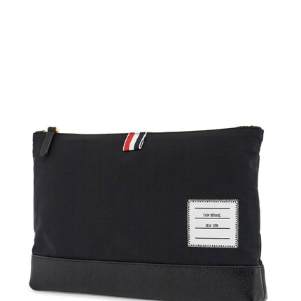 Thom Browne large pouch with gold zip and black tricolor stripe