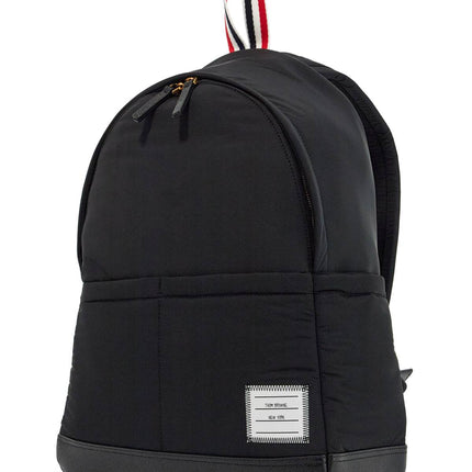 Thom Browne black multipocket backpack in polyester and leather with adjustable straps