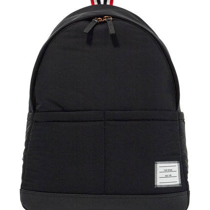 Thom Browne black multipocket backpack in polyester and leather with adjustable straps