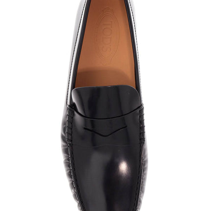 Tod'S men's black calfskin loafers with elegant insert and rubber sole