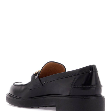 Tod'S metal logo loafers with metal detailing