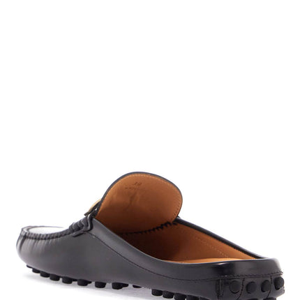 Tod'S black calfskin slip-on loafers with metallic strap and rubber sole