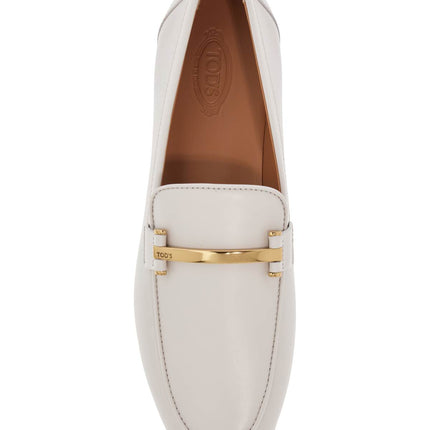 Tod'S white calfskin moccasin with gold bar and velcro closure