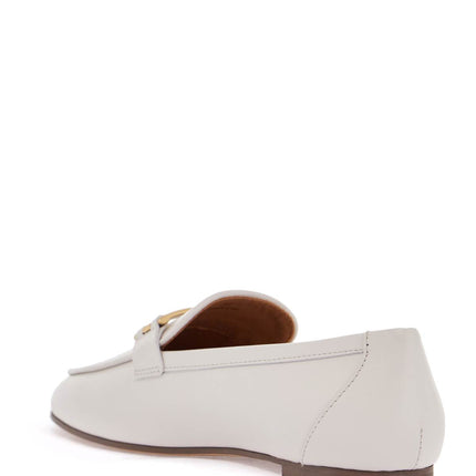 Tod'S white calfskin moccasin with gold bar and velcro closure