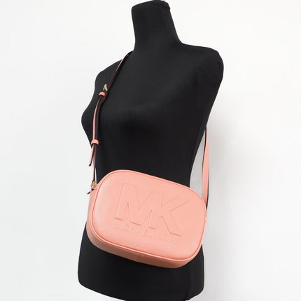 Bolsa de viaje Jet Set Cámara Crossbody ovalada de piel Sherbert mediana