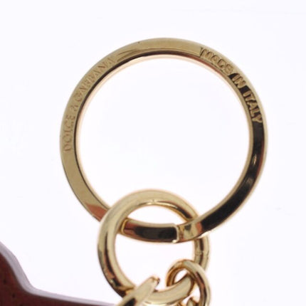 Elegante sleutelhanger van bruin leer met gouden details